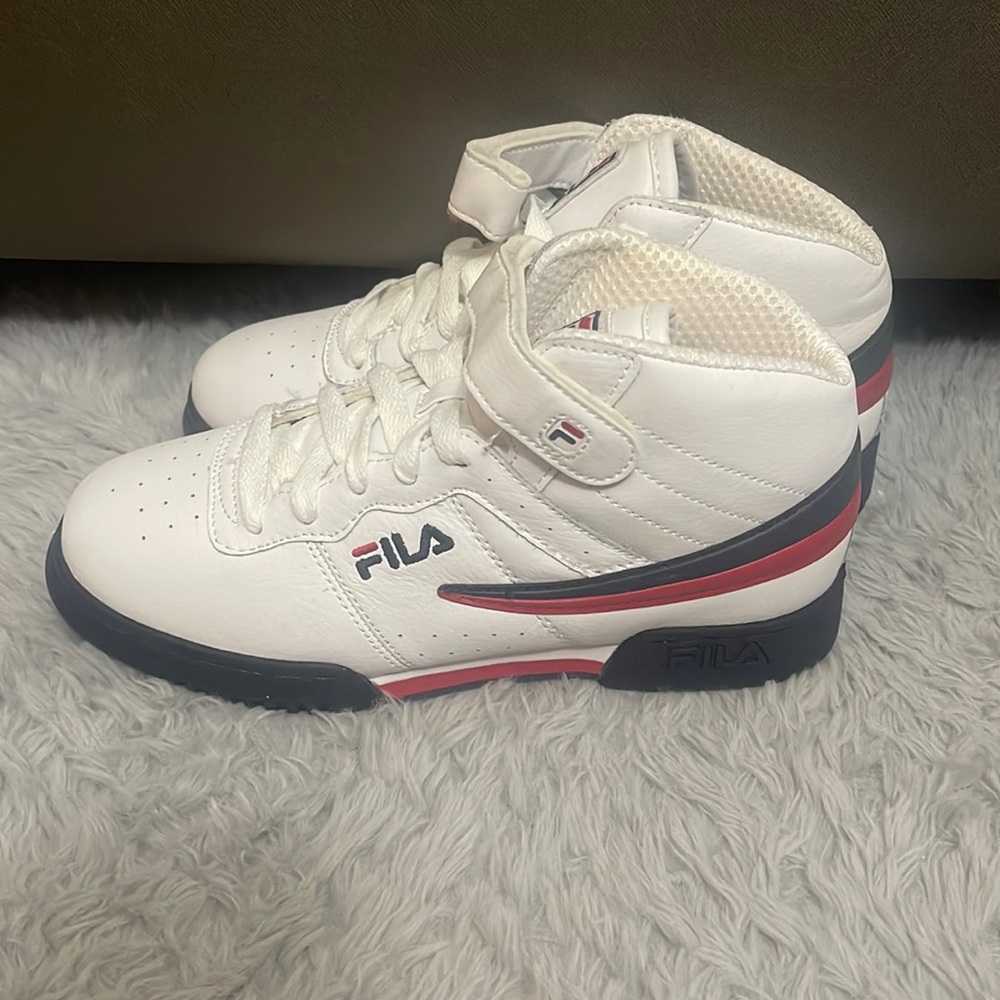White, blue and red striped Fila